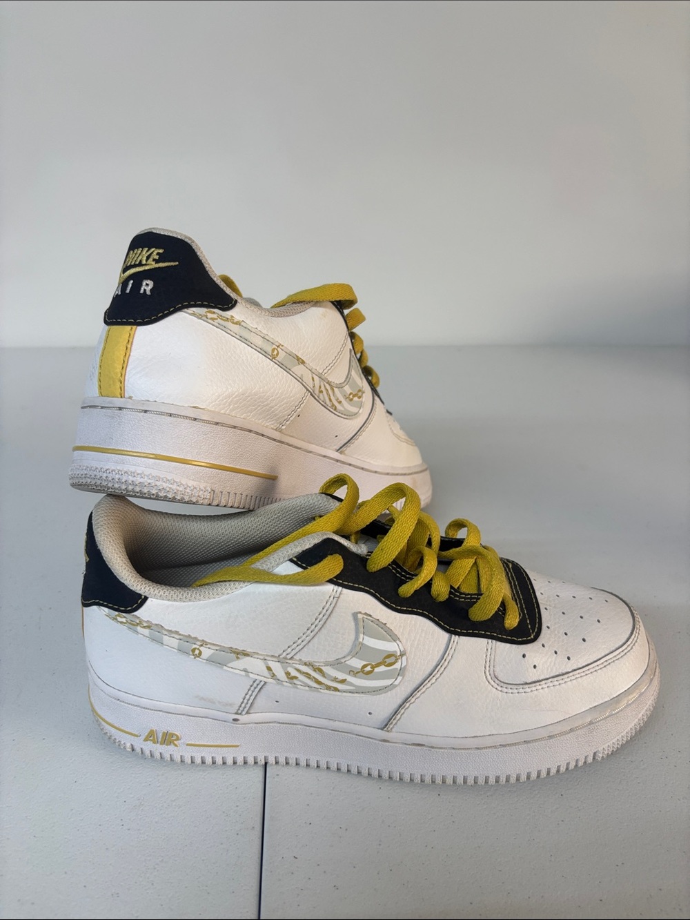 Nike Kids White Sneakers with Yellow Accents